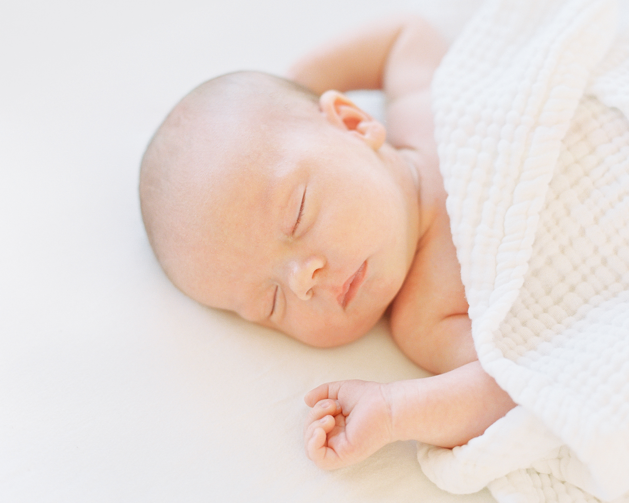 Kansas City Newborn film Photographer Alissa Bird portraits timeless photo of newborn boy photographed at home in Brookside